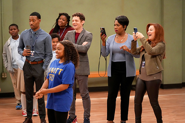 Chris Perfetti (center) and the cast of Abbott Elementary
