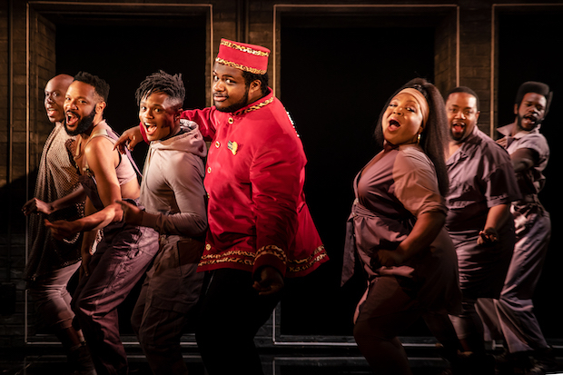 Jaquel Spivey (center) leads the cast of A Strange Loop on Broadway.