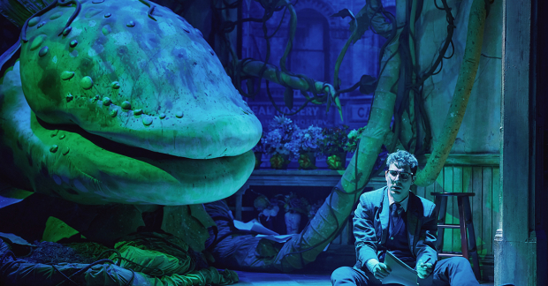 Skylar Astin and Audrey II in Little Shop of Horrors