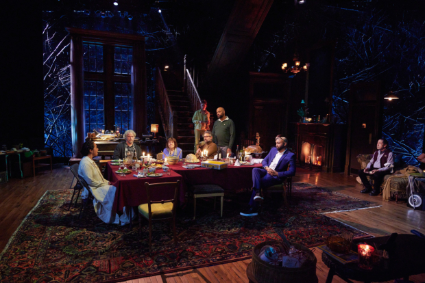 Carmen Zilles, C.J. Wilson, Marylouise Burke, Colby Minifie, Omar Metwally (seated), David Ryan Smith, Francois Battiste, and Jonathan Hadary in Epiphany. Set design by John Lee Beatty.