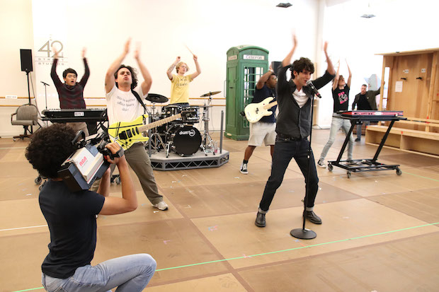 Diego Lucano, Ben Wang, Gian Perez, Anthony Genovesi, Elijah Lyons, Adam Bregman, and Michael Lepore rehearse for Sing Street at the Huntington. 