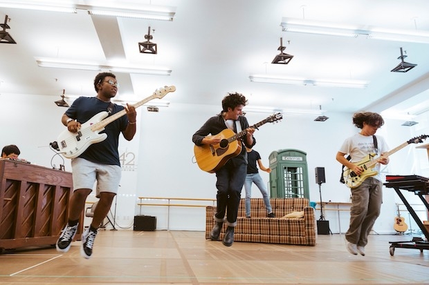 Elijah Lyons, Adam Bregman, and Gian Perez star in Sing Street, directed by Rebecca Taichmann, at the Huntington.