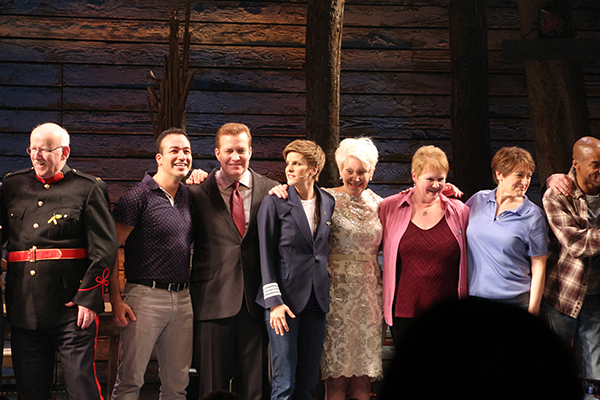 Caesar Samayoa (second-from-left) and the cast of Come From Away with their real-life counterparts on opening night.