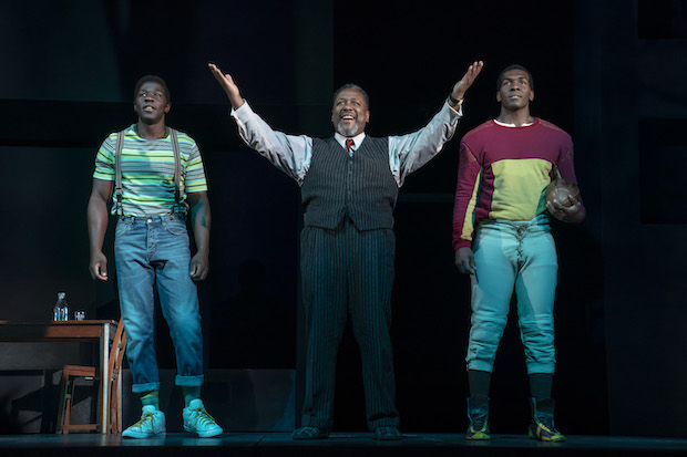 McKinley Belcher III plays Happy, Wendell Pierce plays Willy, and Khris Davis plays Biff in Arthur Miller&#39;s Death of a Salesman, directed by Miranda Cromwell, at Broadway&#39;s Hudson Theatre. 