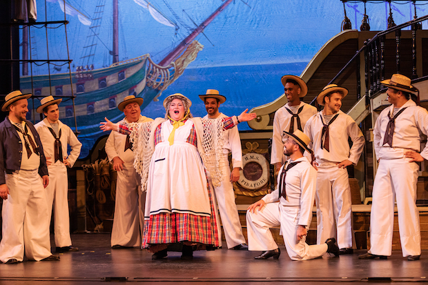 Angela Christine Smith (center) plays Little Buttercup in  H.M.S. Pinafore, directed by Albert Bergeret, for New York Gilbert and Sullivan Players at the Kaye Playhouse. 