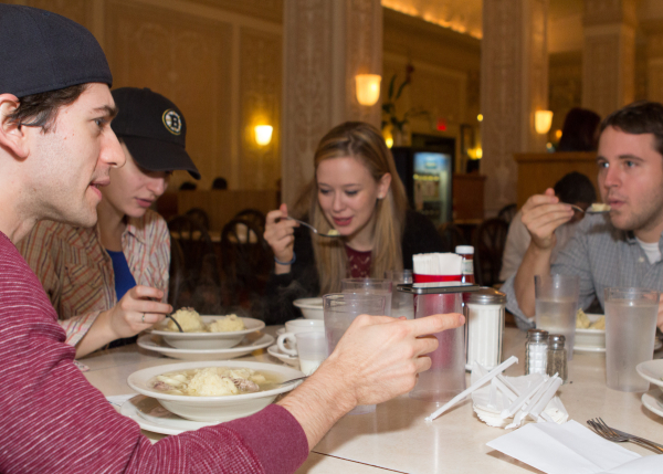 Bad Jews cast member Michael Zegen shares his feelings on the Edison's matzo ball soup as his colleagues Tracee Chimo, Molly Ranson, and Joshua Harmon look on.