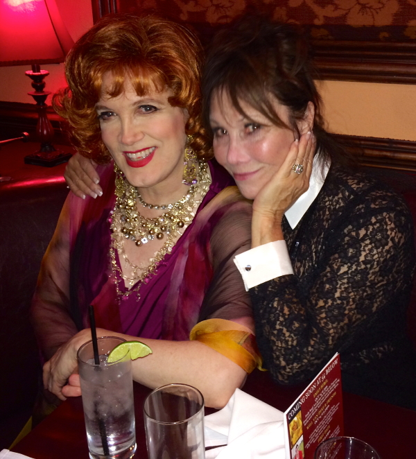 Charles Busch shares an intimate moment with Michele Lee. 