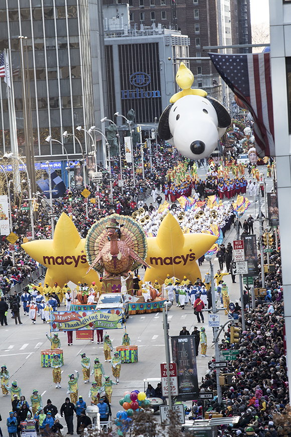 The Macy's Thanksgiving Day Parade begins its path down 6th Avenue.