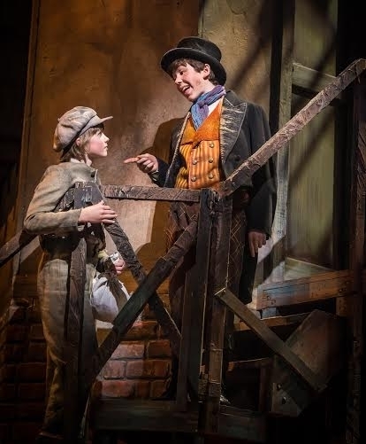 Tyler Moran (Oliver) and Ethan Haberfield (Artful Dodger) in Oliver! at Paper Mill Playhouse.