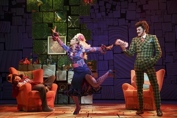 (l to r): Taylor Trensch as Michael Wormwood, Lesli Margherita as Mrs. Wormwood, and Gabriel Ebert as Mr. Wormwood in Matilda at Broadway&#39;s Shubert Theatre.