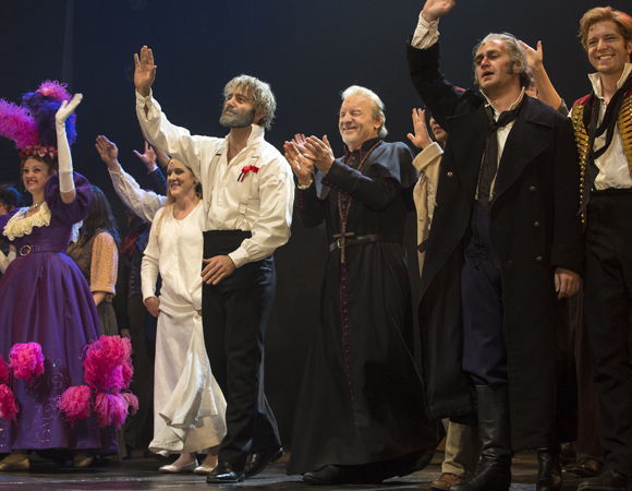 The Toronto cast of Les Misérables take their bows at the Prince of Wales Theatre.