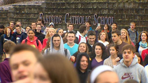 Students rally outside Seattle&#39;s Eastside Catholic School in protest of the firing of their teacher for marrying his same-sex partner.