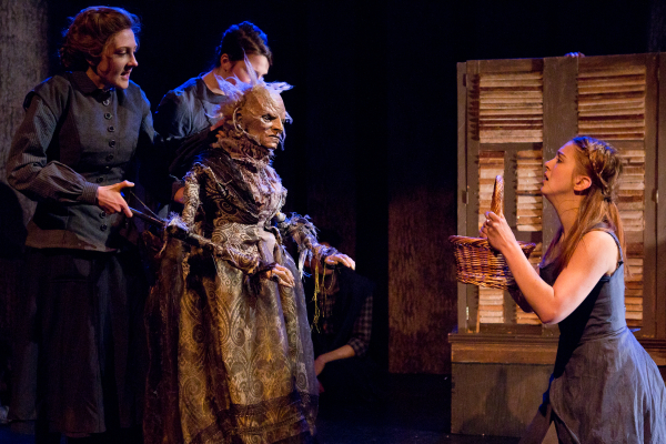 Amanda Adele Lederer and Carol Uraneck operating the Witch of the East puppet with Eliza Simpson in the role of Nimmie in The Woodsman at 59E59 Theaters.