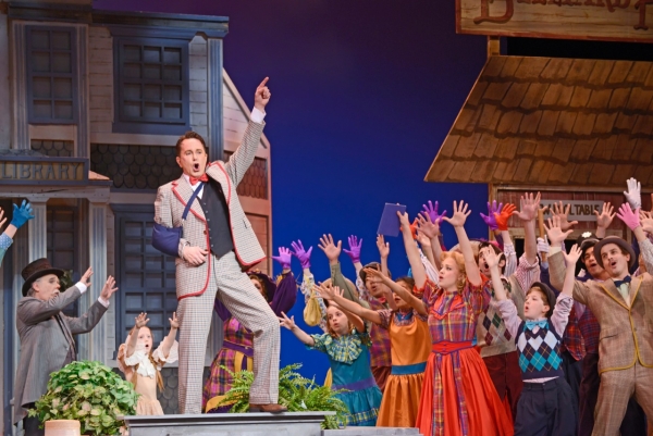 Davis Gaines as Professor Harold Hill with the company of Musical Theatre West&#39;s production of Meredith Willson&#39;s The Music Man, directed by Jeff Maynard, now playing at the Carpenter Center for the Performing Arts in Long Beach.