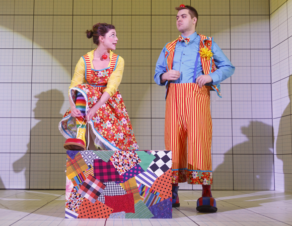 In a scene from Caryl Churchill&#39;s Love and Information, a production of New York Theatre Workshop directed by James Macdonald, Susannah Flood and Nate Miller play clowns getting ready to perform at a party.