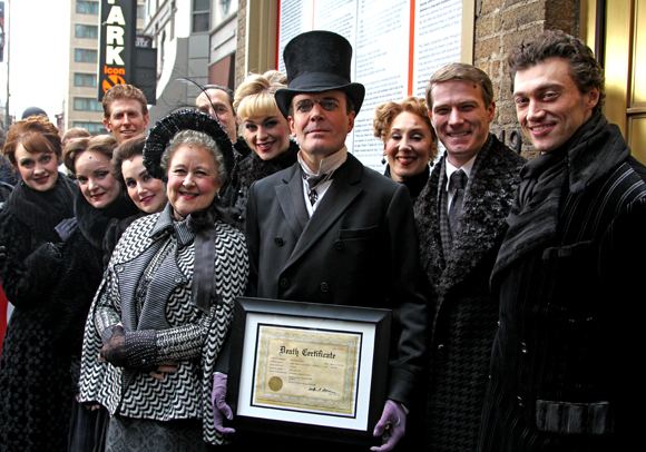 Jefferson Mays shows off his commemorate death certificate after dying 1,000 times in A Gentleman&#39;s Guide to Love and Murder.
