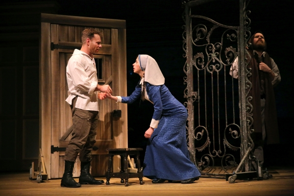 Noah Brody as Claudio, Emily Young as Isabella, and Andy Grotelueschen as Duke Vincentio is Fiasco Theater's production of William Shakespeare's Measure for Measure, directed by Noah Brody and Ben Steinfeld, at the New Victory Theater.