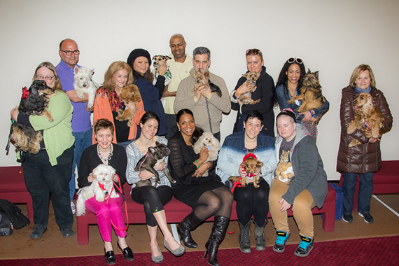 Audra McDonald poses with all of the auditioning puppies. 