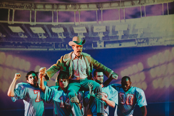 Football coach Bum Phillips (Gary Ramsey) is carried away by his players in Peter Stopschinski&#39;s Bum Phillips All-American Opera, directed by Luke Leonard, at La MaMa&#39;s Ellen Stewart Theatre.