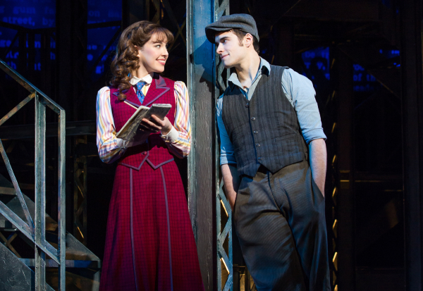 Corey Cott and Liana Hunt as newsboy Jack Kelly and winsome reporter Katherine on the stage of the Nederlander Theatre. 