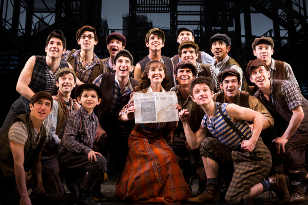 Liana Hunt (center) with the current company of Broadway&#39;s Newsies.