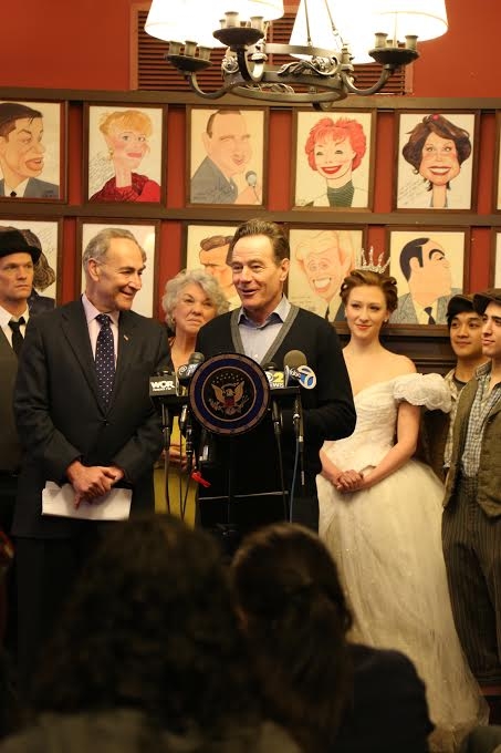 Bryan Cranston, star of Broadway&#39;s All the Way, stands beside Senator Schumer as Neil Patrick Harris, Tyne Daly of Mothers and Sons, Kaitlyn Davidson of Cinderella, and Julian DeGuzman and Jess Le Protto of Newsies stand in support of the Broadway tax break. 