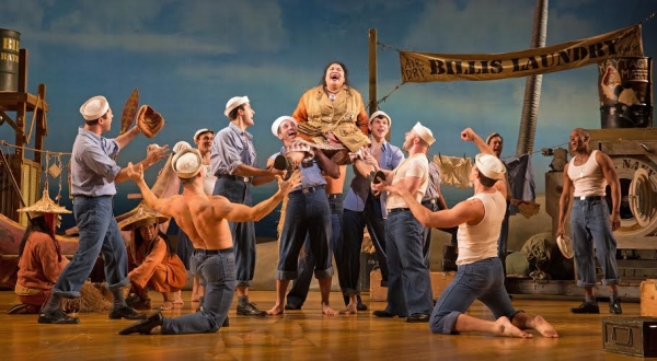 Loretta Ables Sayre as Bloody Mary and the cast of South Pacific, directed by Rob Ruggiero, at Paper Mill Playhouse.