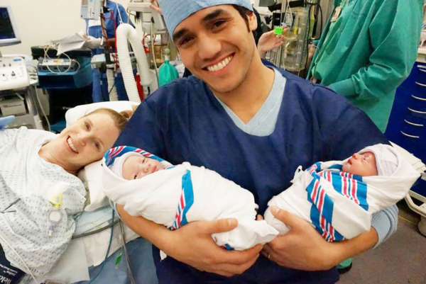 Adam Jacobs and his wife, actress Kelly Jacobs, with their new twin sons, Jack and Alex.