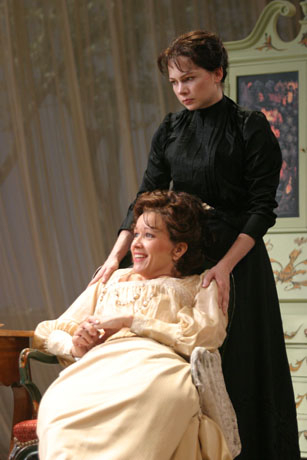 Michelle Williams (standing) as Varya and Linda Emond (seated) as Madame Ranevskaya in Michael Greif&#39;s 2004 production of The Cherry Orchard at Williamstown Theatre Festival.