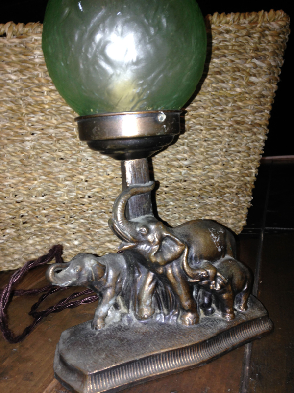 This is the elephant lamp that sits on Sam Harris&#39; desk in Act One. 