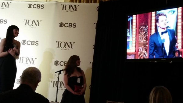 Lena Hall watches as Hedwig costar Neil Patrick Harris gives his Tony acceptance speech.