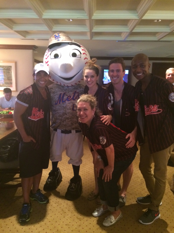 Members of the Kinky Boots cast pose with Mr. Met.