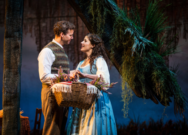 Kevin Earley as Tommy Albright and Jennie Sophia as Fiona MacLaren in Lerner and Loewe's Brigadoon, directed by Rachel Rockwell, at the Goodman Theatre.