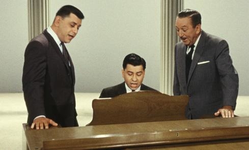 Busker Alley composers Robert and Richard Sherman with their frequent creative collaborator Walt Disney.