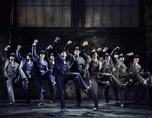 Nick Cordero (center) with the cast of Bullets Over Broadway at the St. James Theater.