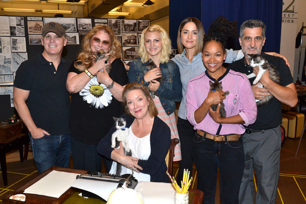 Director Scott Ellis poses with cat-holding members of the cast of You Can&#39;t Take It With You, set to bow on Broadway for the first time in 30 years.