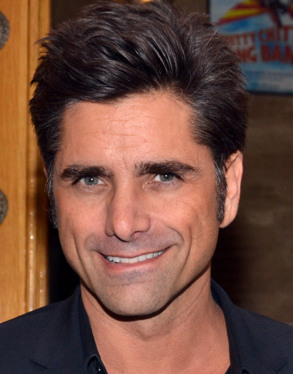 John Stamos will play a longtime bachelor who discovers he has a child in a new Fox pilot.