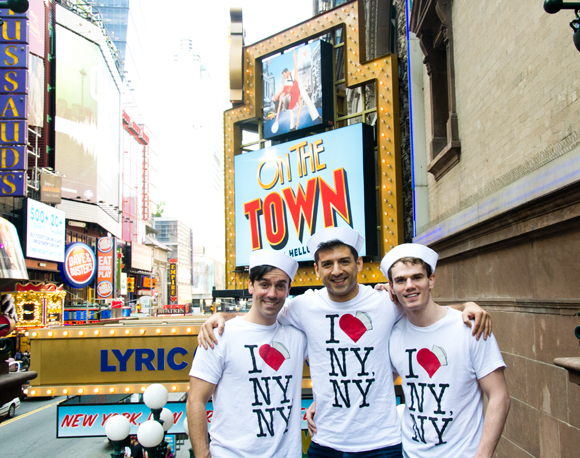 On the Town stars Clyde Alves, Tony Yazbeck, and Jay Armstrong Johnson pose near their marquee at the Lyric Theatre.