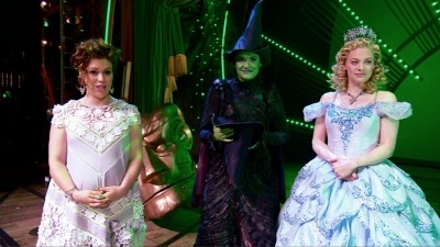 Alyssa Milano with Wicked stars Christine Dwyer and Jenni Barber onstage at the Gershwin Theater. 
