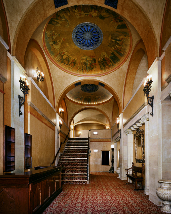 The men&#39;s room is now at the top of these stairs in the lobby of Broadway&#39;s Al Hirschfeld Theatre.