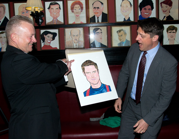 Christopher Sieber sees his Sardi&#39;s caricature for the very first time.