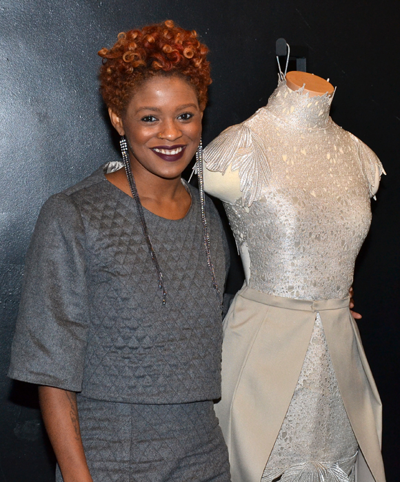 Project Runways: All Stars designer Sonjia Williams with her winning dress, inspired by Broadway&#39;s Wicked.
