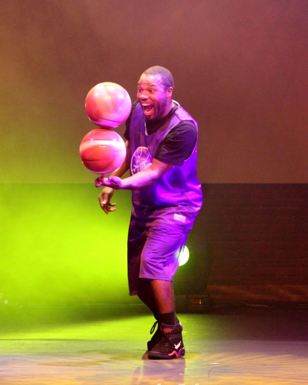 Basketball freestyler Rashaun Daniels spins two basketballs on one finger in 360 Allstars.