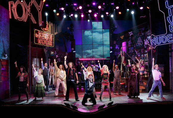 The full company of Rock of Ages at the Helen Hayes Theatre.