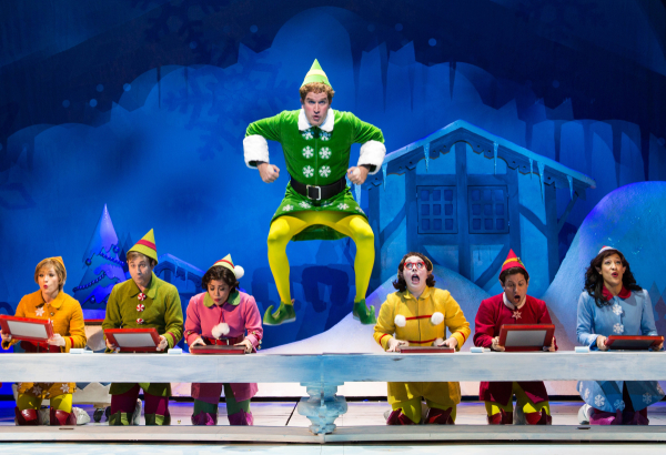 James Moye as Buddy the Elf with the cast of the musical Elf at Paper Mill Playhouse.