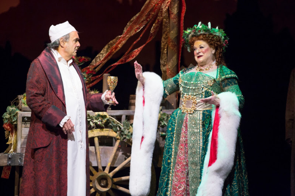 Edward Gero as Scrooge and Anne Stone as Ghost of Christmas Present in the Ford's Theatre production of A Christmas Carol.
