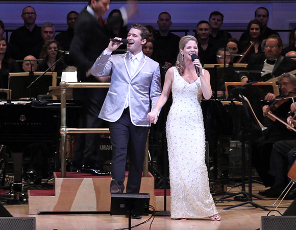 Matthew Morrison and Kelli O&#39;Hara in The New York Pops concert Kelli and Matthew: Home for the Holidays, conducted by Steven Reineke, at Carnegie Hall. 