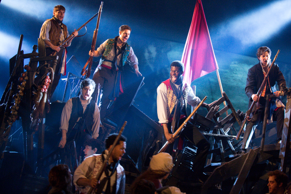 The cast of Les Misérables takes the stage.