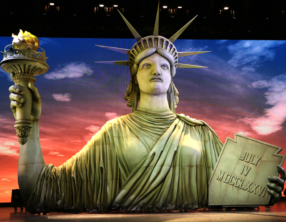 The Statue of Liberty puppet is 26-feet tall and features 20 motors in her face alone.